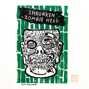 Shrunken Zombie Head by Ken Decore